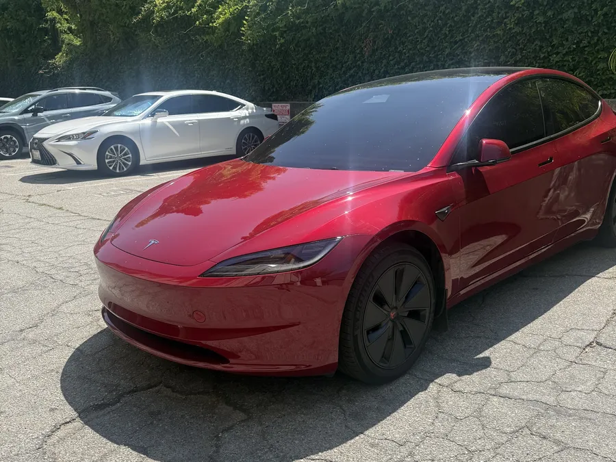 Red Tesla Model 3 after ceramic tint