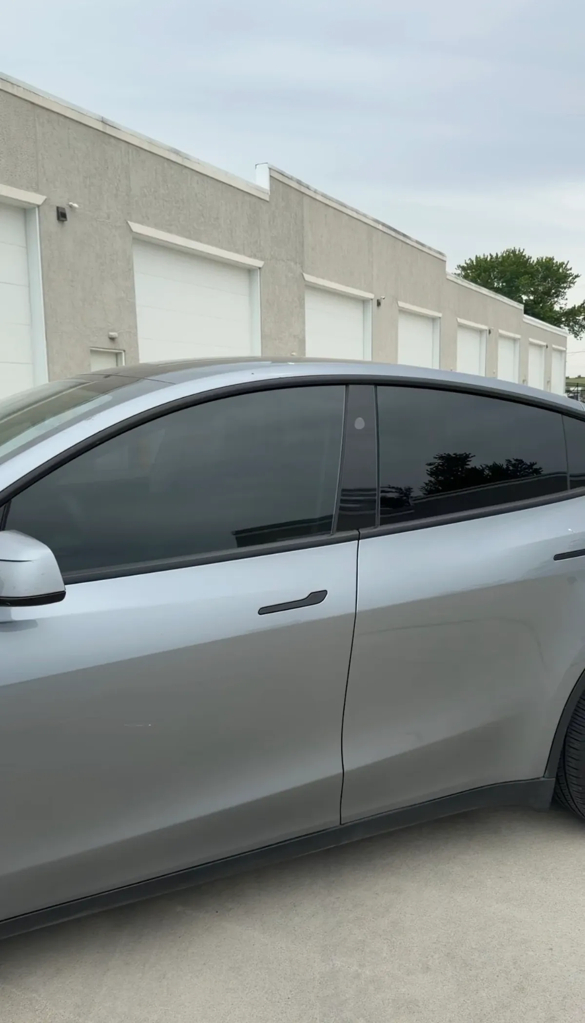 Silver sedan with professionally tinted windows