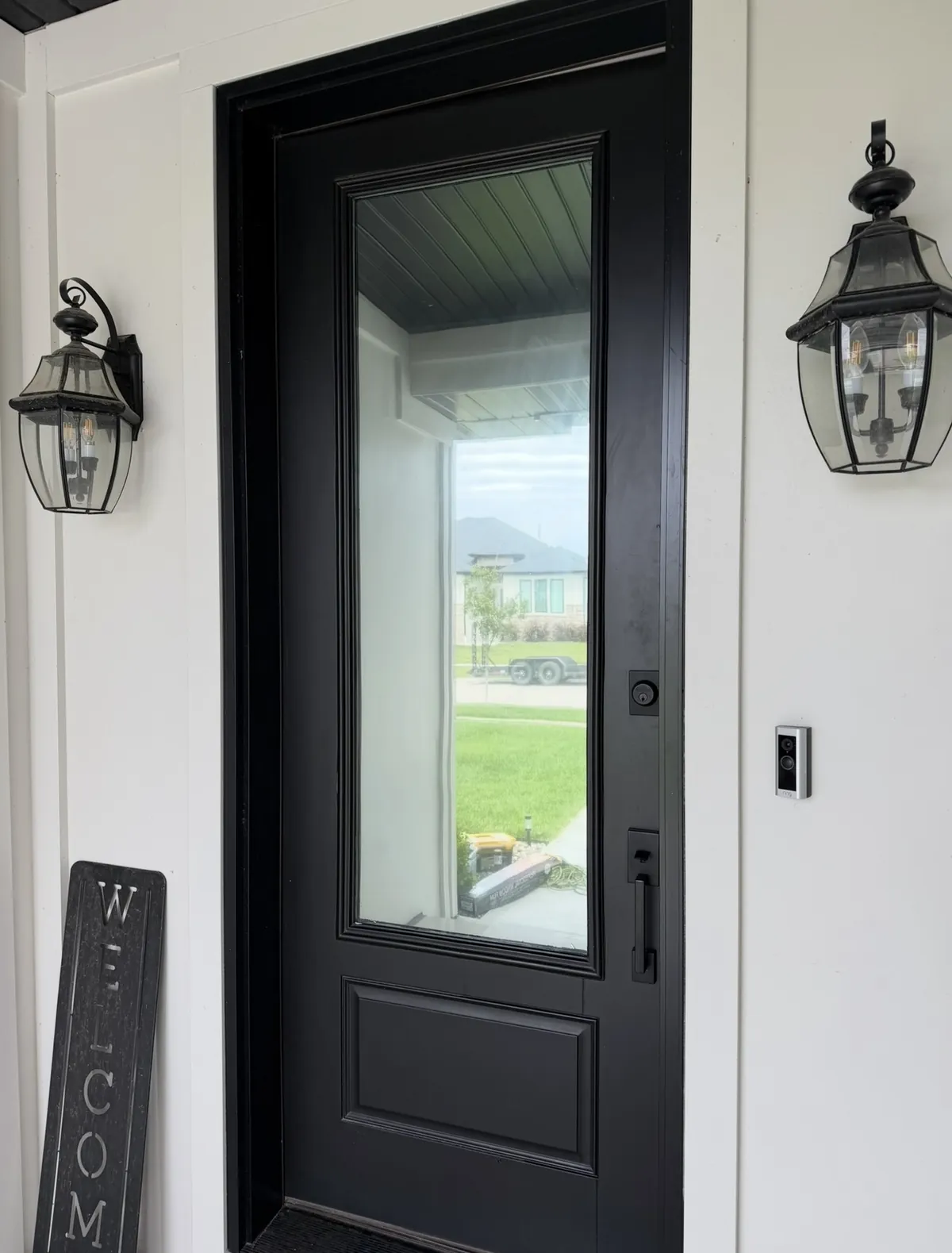 Residential entry door with professionally tinted glass