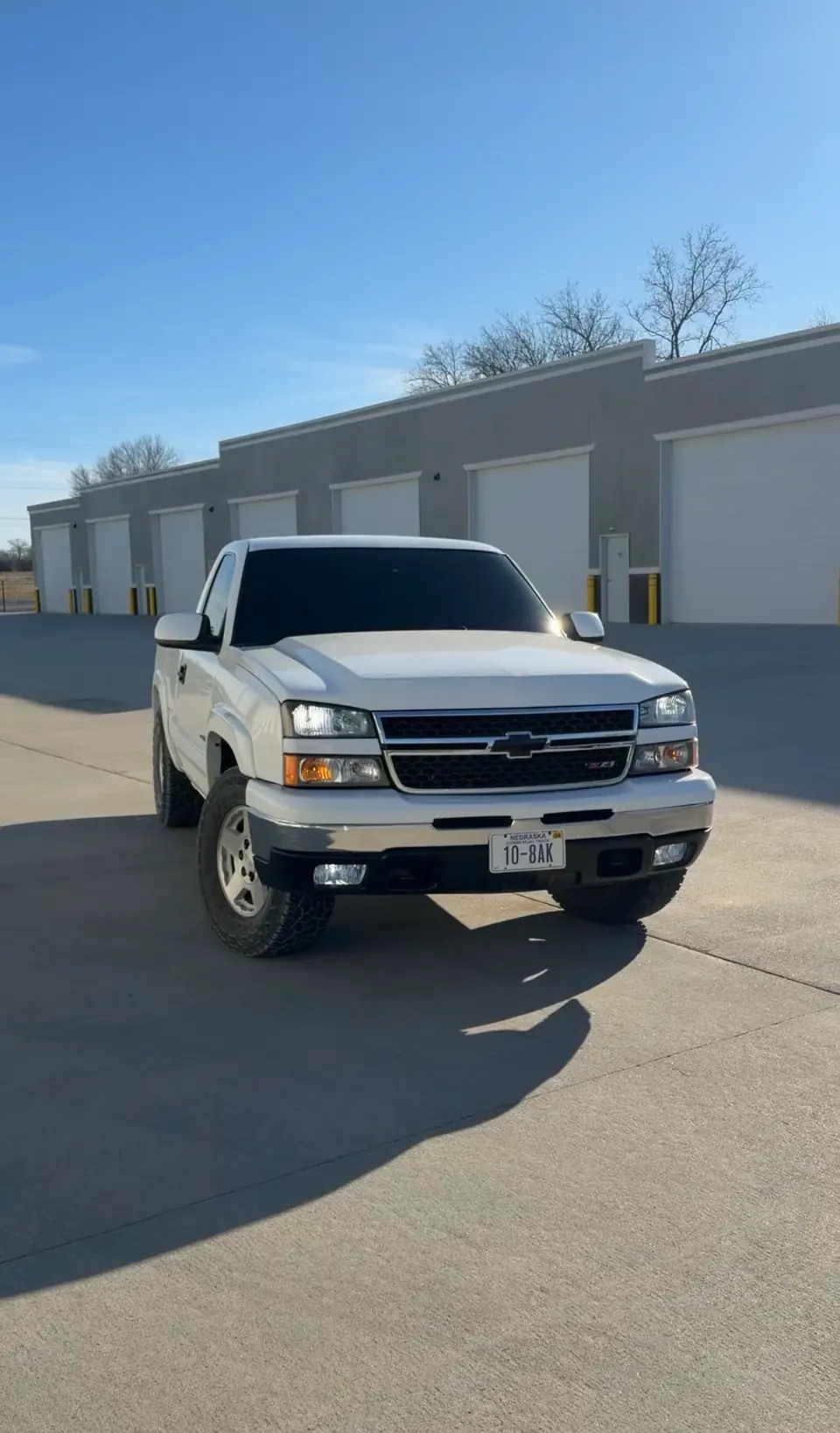 White Chevrolet Silverado after automotive window tinting